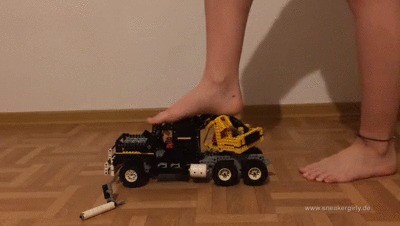 Sneaker-girl Gylvana Crushes A Lego Toy Truck